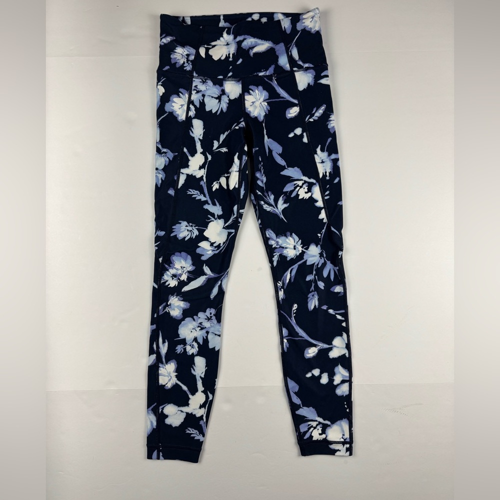 Athleta Water Flower Salutation 7/8 lengths leggings navy blue white XS